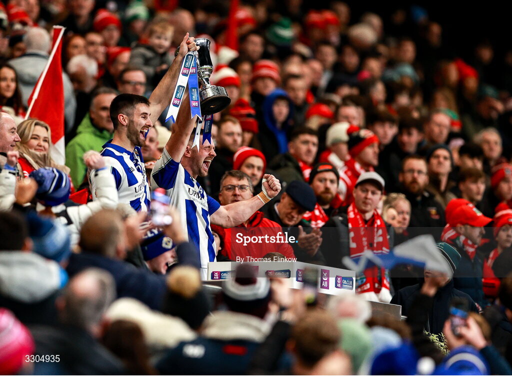 6 December 2025; Ballyboden St Enda's captain Shane Clayton, left, and vice-captain James Holland lift the Seán McCabe Cup after their side's victory the AIB Leinster GAA Football Senior Club Championship final match between Athy of Kildare and Ballyboden St Enda's of Dublin at Croke Park in Dublin. Photo by Thomas Flinkow/Sportsfile
