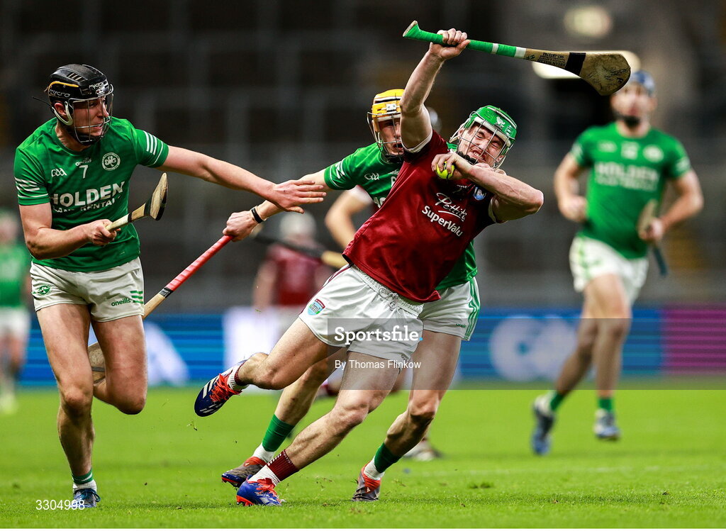 6 December 2025; Jake Firman of St Martin’s in action against Shamrocks Ballyhale's players Darragh Corcoran, left, and Richie Reid during the AIB Leinster GAA Hurling Senior Club Championship final match between St Martin's of Wexford and Shamrocks Ballyhale of Kilkenny at Croke Park in Dublin. Photo by Thomas Flinkow/Sportsfile