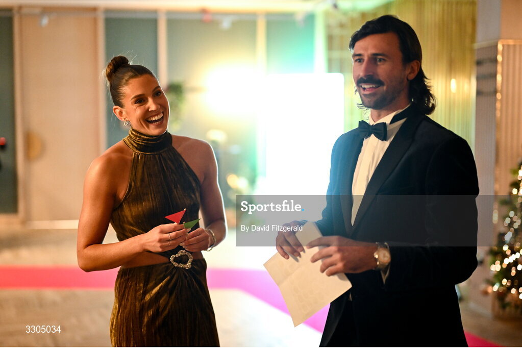 6 December 2025; World Silver Medallist in Heptathlon and nominee for Female Athlete of the Year, sponsored by Allianz, and Olympic Sporting Moment of the Year, sponsored by Fiat, Kate O'Connor, left, shares a joke with Olympian and Athletes Comission member Harry McNulty during the Team Ireland Olympic Sport Awards 2025 at The Royal Convention Centre in Dublin. Photo by David Fitzgerald/Sportsfile