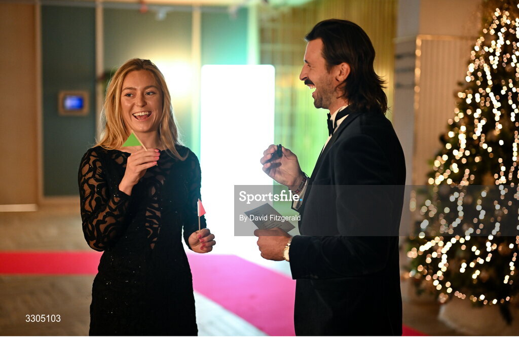 6 December 2025; World Champion in Cycling and nominee for Female Athlete of the Year, sponsored by Allianz, Lara Gillespie, shares a joke with Olympian and Athletes Commission member Harry McNulty during the Team Ireland Olympic Sport Awards 2025 at The Royal Convention Centre in Dublin. Photo by David Fitzgerald/Sportsfile