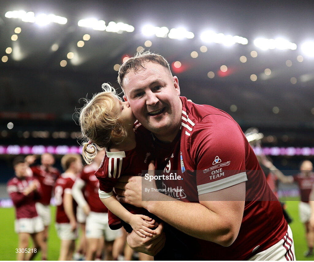 6 December 2025; Joe Coleman of St Martin’s celebrates with his daughter Darcy after his side's victory in the AIB Leinster GAA Hurling Senior Club Championship final match between St Martin's of Wexford and Shamrocks Ballyhale of Kilkenny at Croke Park in Dublin. Photo by Thomas Flinkow/Sportsfile