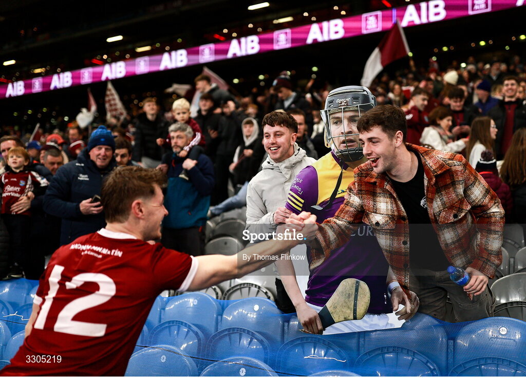 6 December 2025; Jake Firman of St Martin’s celebrates with supporters after his side's victory in the AIB Leinster GAA Hurling Senior Club Championship final match between St Martin's of Wexford and Shamrocks Ballyhale of Kilkenny at Croke Park in Dublin. Photo by Thomas Flinkow/Sportsfile