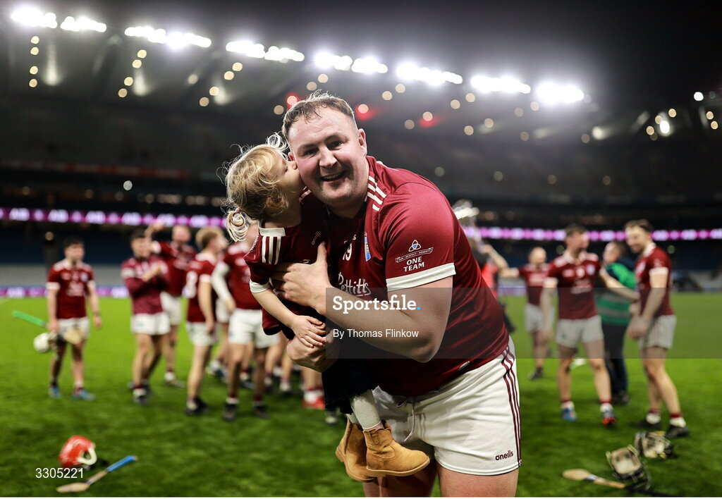 6 December 2025; Joe Coleman of St Martin’s celebrates with his daughter Darcy after his side's victory in the AIB Leinster GAA Hurling Senior Club Championship final match between St Martin's of Wexford and Shamrocks Ballyhale of Kilkenny at Croke Park in Dublin. Photo by Thomas Flinkow/Sportsfile