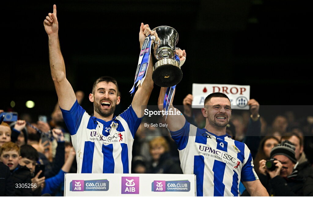 6 December 2025; Ballyboden St Enda's captain Shane Clayton, left, and vice-captain James Holland lift the Seán McCabe Cup after their side's victory in the the AIB Leinster GAA Football Senior Club Championship final match between Athy of Kildare and Ballyboden St Enda's of Dublin at Croke Park in Dublin. Photo by Seb Daly/Sportsfile
