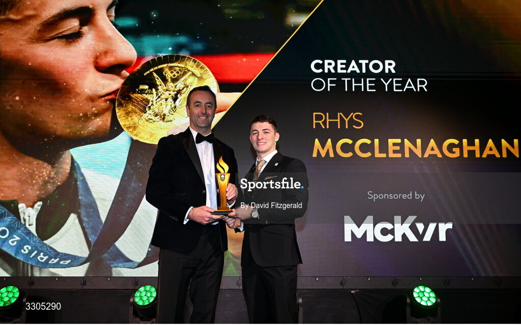 6 December 2025; Olympic Champion in Gymnastics Rhys McClenaghan is presented with the Creator of the Year Award, sponsored by McKeever Sports, by Padraic McKeever, Managing Director of McKeever Sports during the Team Ireland Olympic Sport Awards 2025 at The Royal Convention Centre in Dublin. Photo by David Fitzgerald/Sportsfile