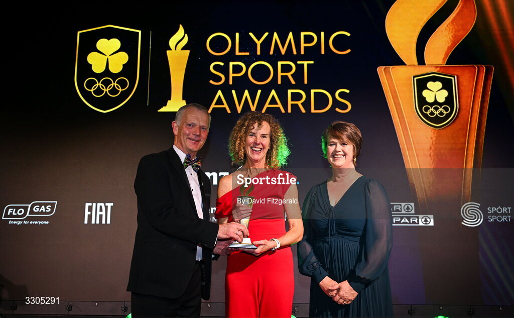 6 December 2025; Inbhear Dee Athletics Club’s Noreen O’Reilly, Eithne Walsh, centre, & Anne-Marie Kelly are presented with the Community Impact Award, sponsored by SPAR/EUROSPAR, by John Moane, Group Chief Executive, BWG Group during the Team Ireland Olympic Sport Awards 2025 at The Royal Convention Centre in Dublin. Photo by David Fitzgerald/Sportsfile