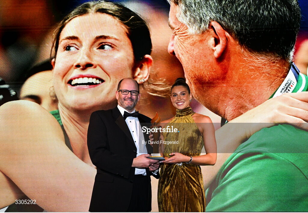 6 December 2025; World Silver Medallist in Heptathlon Kate O'Connor is presented with the Olympic Sporting Moment of the Year Award, Sponsored by Fiat, by John Saunders, Managing Director of Fiat Ireland during the Team Ireland Olympic Sport Awards 2025 at The Royal Convention Centre in Dublin. Photo by David Fitzgerald/Sportsfile