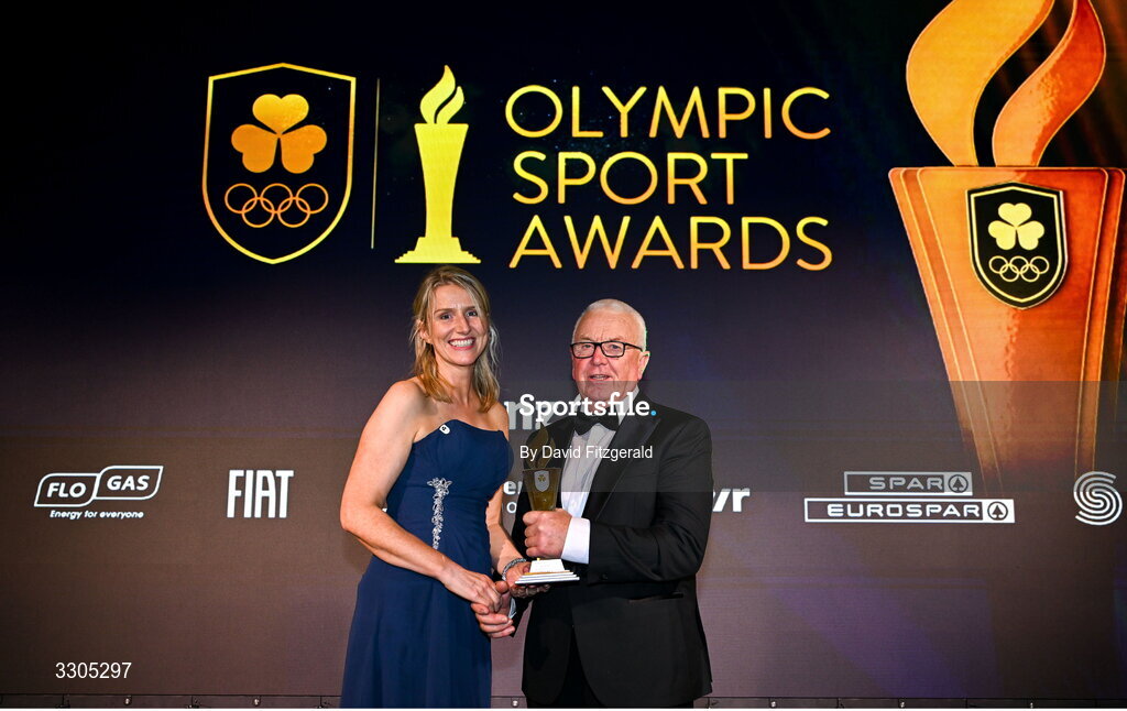 6 December 2025; Rowing Ireland Coach Dominic Casey is presented with the Coach of the Year Award, sponsored by Key Patent Innovations, by Angela Quinlan, Managing Director of Key Patent Innovations, during the Team Ireland Olympic Sport Awards 2025 at The Royal Convention Centre in Dublin. Photo by David Fitzgerald/Sportsfile