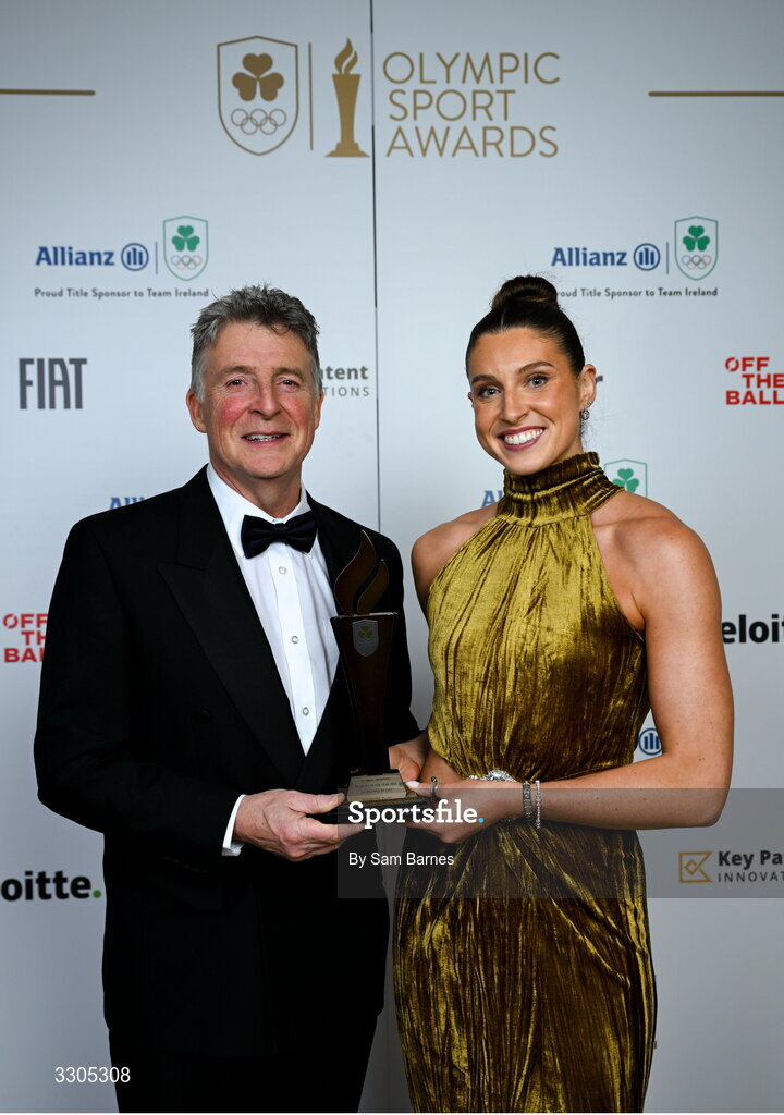 6 December 2025; World Silver Medallist in Heptathlon Kate O'Connor and her father and coach Michael O'Connor pictured with their Olympic Sporting Moment of the Year Award, Sponsored by Fiat, during the Team Ireland Olympic Sport Awards 2025 at The Royal Convention Centre in Dublin. Photo by Sam Barnes/Sportsfile