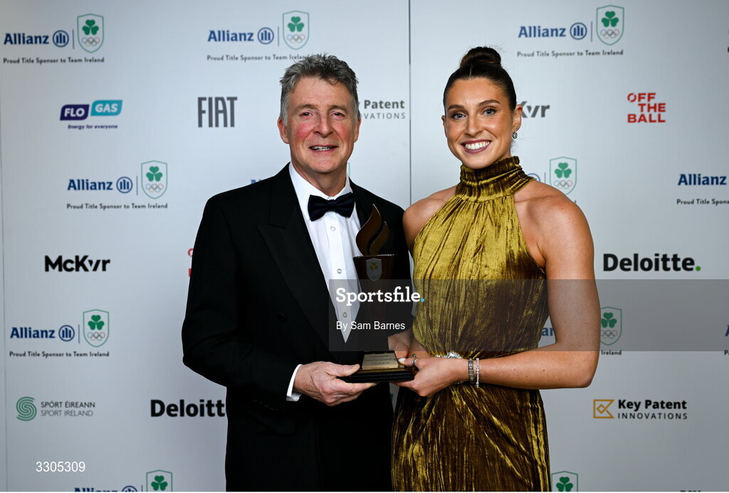 6 December 2025; World Silver Medallist in Heptathlon Kate O'Connor and her father and coach Michael O'Connor pictured with their Olympic Sporting Moment of the Year Award, Sponsored by Fiat, during the Team Ireland Olympic Sport Awards 2025 at The Royal Convention Centre in Dublin. Photo by Sam Barnes/Sportsfile