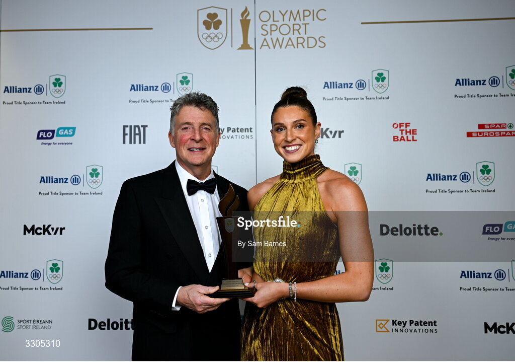 6 December 2025; World Silver Medallist in Heptathlon Kate O'Connor and her father and coach Michael O'Connor pictured with their Olympic Sporting Moment of the Year Award, Sponsored by Fiat, during the Team Ireland Olympic Sport Awards 2025 at The Royal Convention Centre in Dublin. Photo by Sam Barnes/Sportsfile