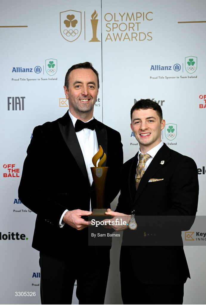 6 December 2025; Olympic Champion in Gymnastics Rhys McClenaghan, right, is presented with the Creator of the Year Award, sponsored by McKeever Sports, by Padraic McKeever, Managing Director of McKeever Sports during the Team Ireland Olympic Sport Awards 2025 at The Royal Convention Centre in Dublin. Photo by Sam Barnes/Sportsfile