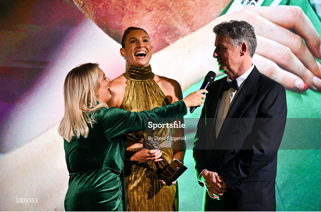 6 December 2025; World Silver Medallist in Heptathlon, Kate O'Connor and her father and coach Michael O'Connor are interviewed by MC Valerie Wheeler during the Team Ireland Olympic Sport Awards 2025 at The Royal Convention Centre in Dublin. Photo by David Fitzgerald/Sportsfile