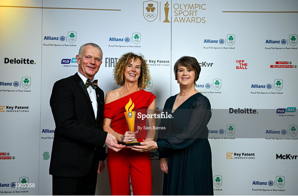 6 December 2025; Inbhear Dee Athletics Club’s  Eithne Walsh, centre, & Anne-Marie Kelly, right, are presented with the Community Impact Award, sponsored by SPAR/EUROSPAR, by John Moane, Group Chief Executive, BWG Group during the Team Ireland Olympic Sport Awards 2025 at The Royal Convention Centre in Dublin. Photo by Sam Barnes/Sportsfile