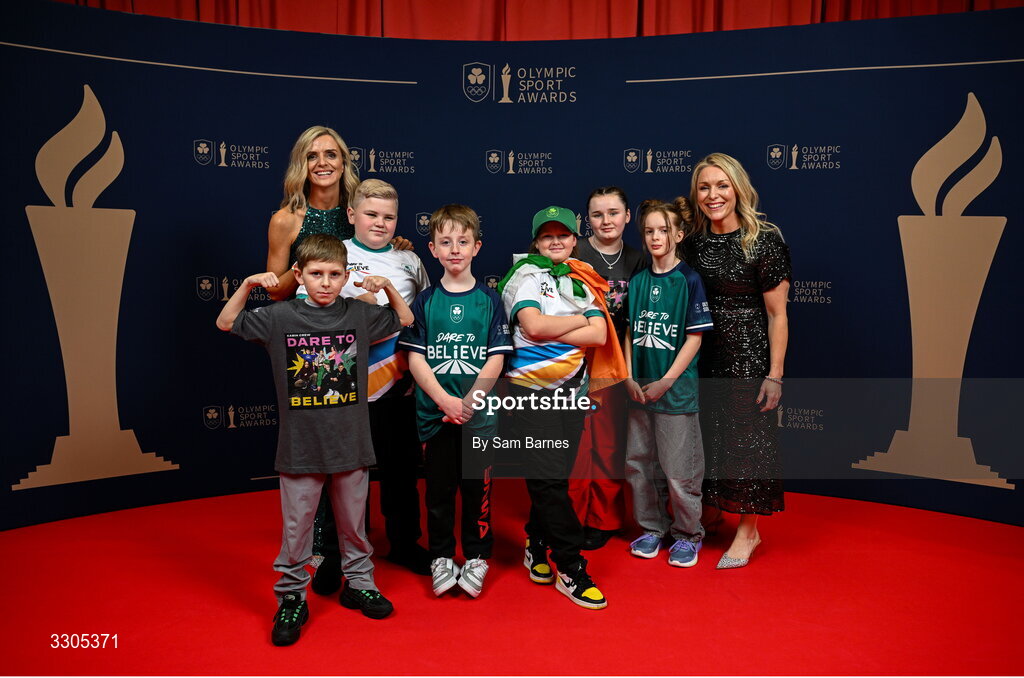 6 December 2025; President of the Irish Olympians Association Roisin McGettigan, left, and Olympic Federation of Ireland Programmes Manager Roisin Jones, with Kabin crew during the Team Ireland Olympic Sport Awards 2025 at The Royal Convention Centre in Dublin. Photo by Sam Barnes/Sportsfile