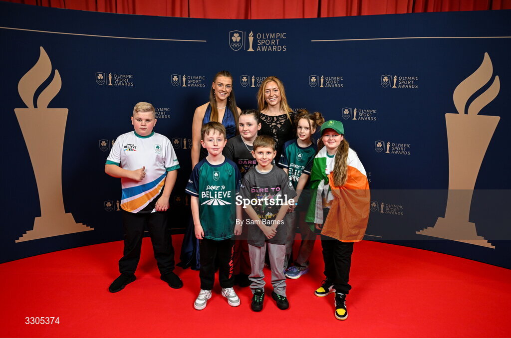 6 December 2025; World Bronze Medallist in Sailing and nominee for Rising Star, sponsored by Sport Ireland, Eve McMahon, back left, and World Champion in Cycling and nominee for Female Athlete of the Year, sponsored by Allianz, Lara Gillespie, back right with Kabin crew during the Team Ireland Olympic Sport Awards 2025 at The Royal Convention Centre in Dublin. Photo by Sam Barnes/Sportsfile