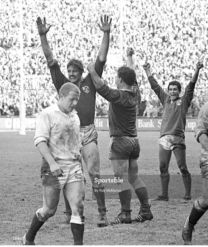 30 March 1985; Ireland players Willie Anderson, left, Jim McCoy and Michael Bradley, right, celebrate winning the Triple Crown at the final whistle. Five Nations Rugby Championship, Ireland v England, Lansdowne Road, Dublin. Picture credit: Ray McManus / SPORTSFILE