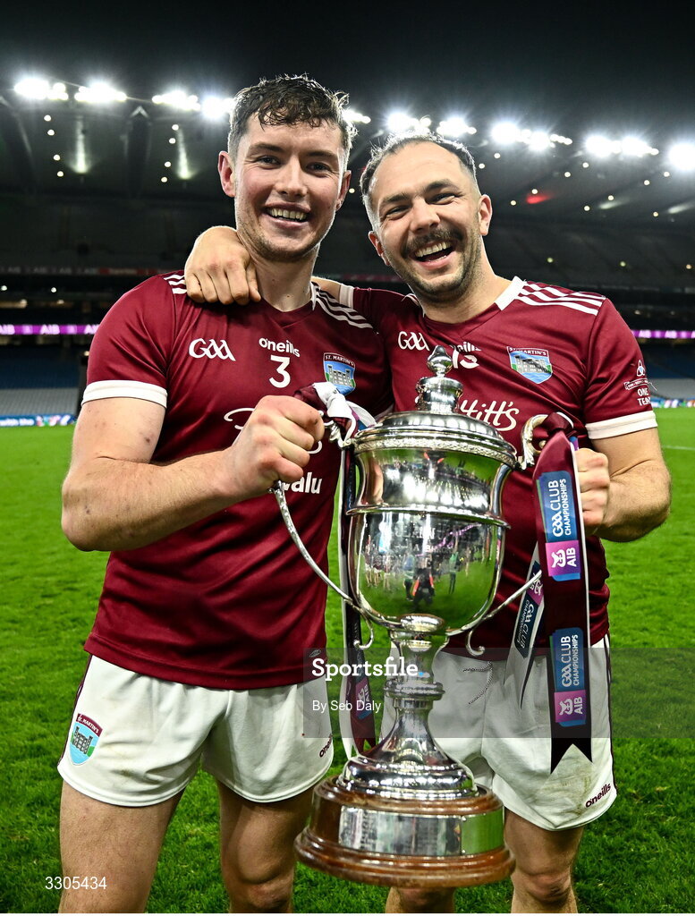 6 December 2025; St Martin's players Conor Firman, left, and Michael Coleman with the O'Neill Cup after their side's victory in the AIB Leinster GAA Hurling Senior Club Championship final match between St Martin's of Wexford and Shamrocks Ballyhale of Kilkenny at Croke Park in Dublin. Photo by Seb Daly/Sportsfile