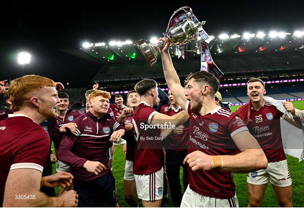 6 December 2025; St Martin's captain Conor Firman celebrates with the O'Neill Cup alongside teamates after their side's victory in the AIB Leinster GAA Hurling Senior Club Championship final match between St Martin's of Wexford and Shamrocks Ballyhale of Kilkenny at Croke Park in Dublin. Photo by Seb Daly/Sportsfile