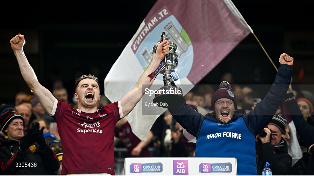 6 December 2025; Rory O’Connor of St Martin's, left, and selector Joe O'Connor lift the O'Neill Cup after their side's victory in the AIB Leinster GAA Hurling Senior Club Championship final match between St Martin's of Wexford and Shamrocks Ballyhale of Kilkenny at Croke Park in Dublin. Photo by Seb Daly/Sportsfile