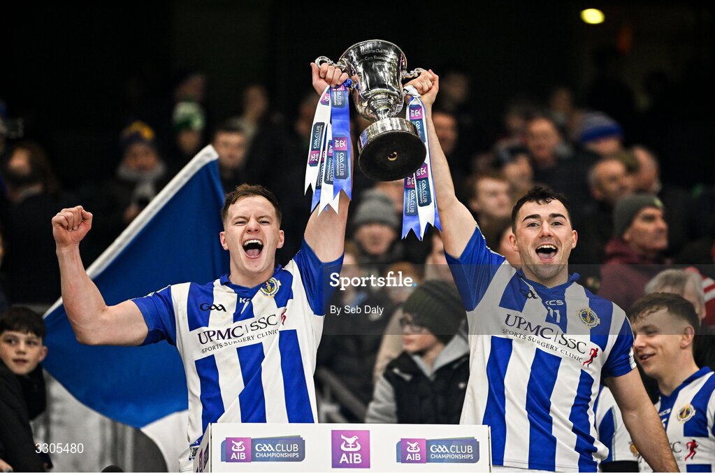 6 December 2025; Ballyboden St Enda's players Peter Healy, left, and Colm Basquel lift the Seán McCabe Cup after their side's victory in the AIB Leinster GAA Football Senior Club Championship final match between Athy of Kildare and Ballyboden St Enda's  of Dublin at Croke Park in Dublin. Photo by Seb Daly/Sportsfile