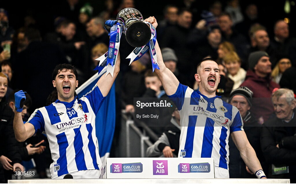 6 December 2025; Ballyboden St Enda's players Ross McGarry, left, and Alex Gavin lift the Seán McCabe Cup after their side's victory in the AIB Leinster GAA Football Senior Club Championship final match between Athy of Kildare and Ballyboden St Enda's  of Dublin at Croke Park in Dublin. Photo by Seb Daly/Sportsfile