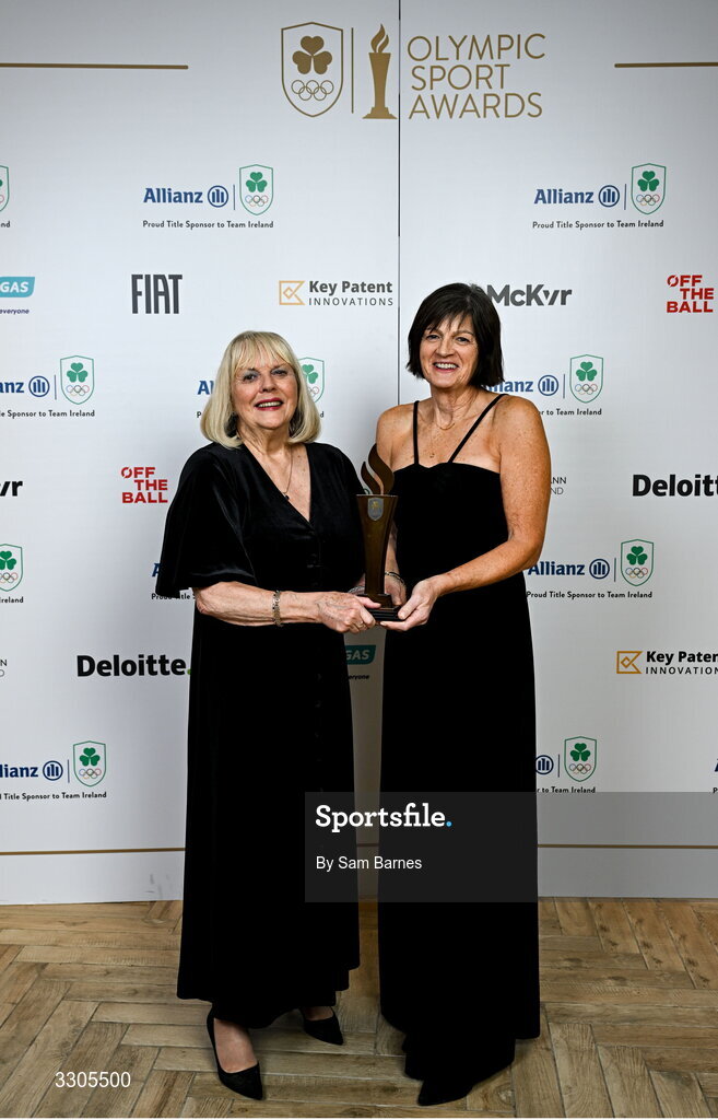 6 December 2025; Shauna Kyle, representing her mother Maeve Kyle, left, and Carolyn Burns, goddaughter of Maeve Kyle, right,  with the President's Award during the Team Ireland Olympic Sport Awards 2025 at The Royal Convention Centre in Dublin. Photo by Sam Barnes/Sportsfile