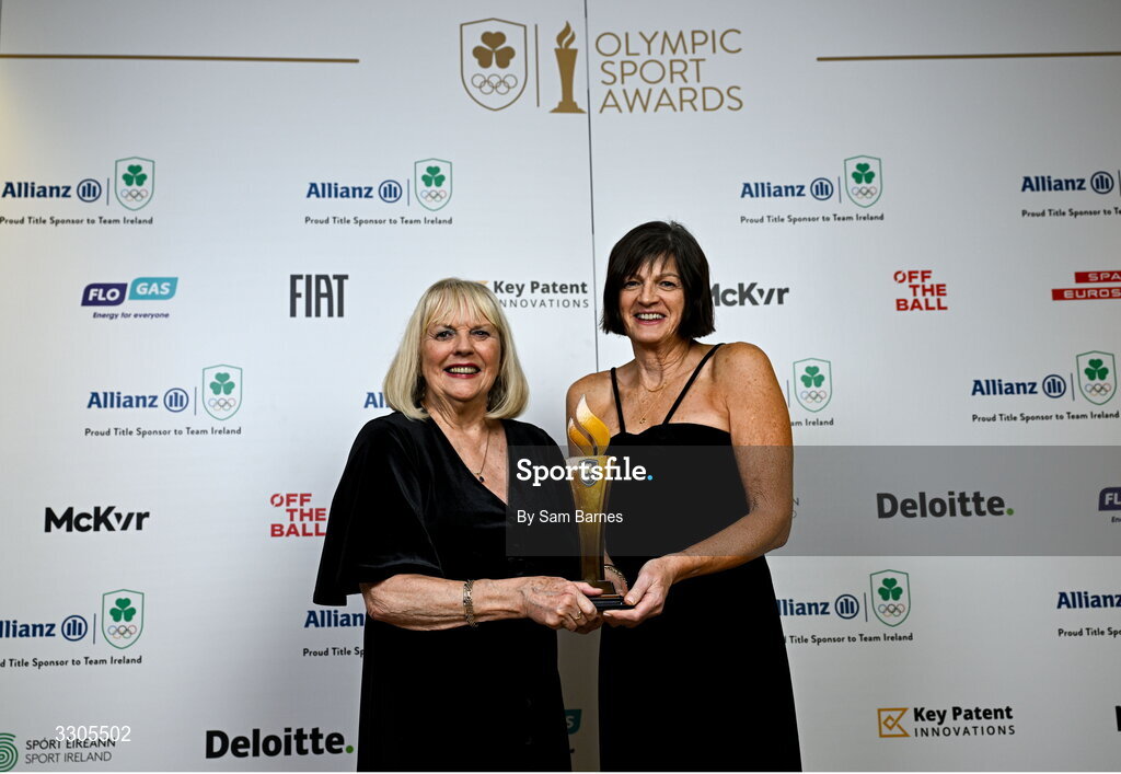 6 December 2025; Shauna Kyle, representing her mother Maeve Kyle, left, and Carolyn Burns, goddaughter of Maeve Kyle, right,  with the President's Award during the Team Ireland Olympic Sport Awards 2025 at The Royal Convention Centre in Dublin. Photo by Sam Barnes/Sportsfile