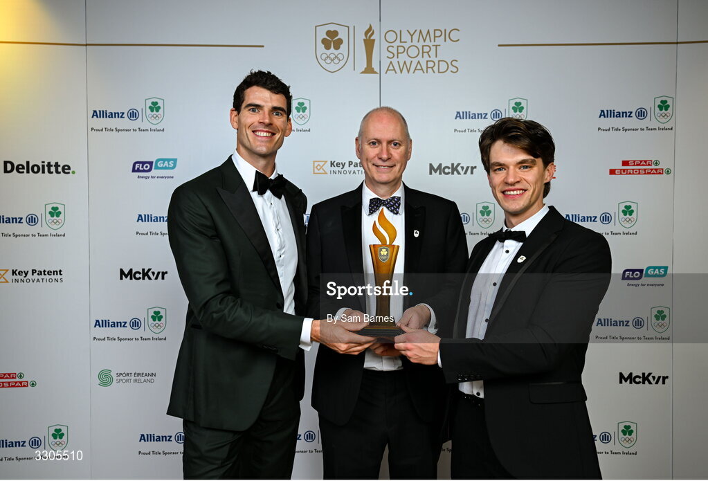 6 December 2025; World Bronze Medallists in Rowing, Fintan McCarthy, right, and Philip Doyle, are presented with the Team of the Year Award, sponsored by Flogas, by John Rooney, Managing Director at Flogas, during the Team Ireland Olympic Sport Awards 2025 at The Royal Convention Centre in Dublin. Photo by Sam Barnes/Sportsfile