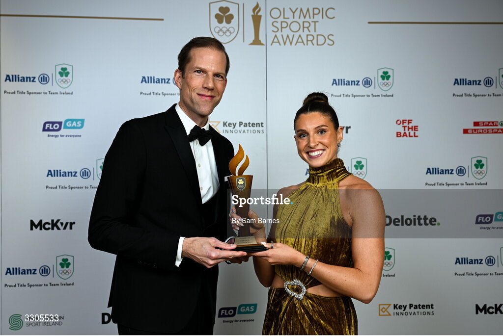 6 December 2025; World Silver Medallist in Heptathlon Kate O'Connor is presented with the Female Athlete of the Year Award, sponsored by Allianz, by Phillip Gronemeyer, Chief Executive of Allianz Ireland, during the Team Ireland Olympic Sport Awards 2025 at The Royal Convention Centre in Dublin. Photo by Sam Barnes/Sportsfile