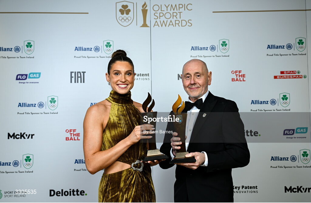 6 December 2025; World Silver Medallist in Heptathlon Kate O'Connor with her Female Athlete of the Year Award, sponsored by Allianz, and Brian McIlroy, representing his nephew Rory McIlroy, with the Male Athlete of the Year Award, sponsored by Allianz,  during the Team Ireland Olympic Sport Awards 2025 at The Royal Convention Centre in Dublin. Photo by Sam Barnes/Sportsfile