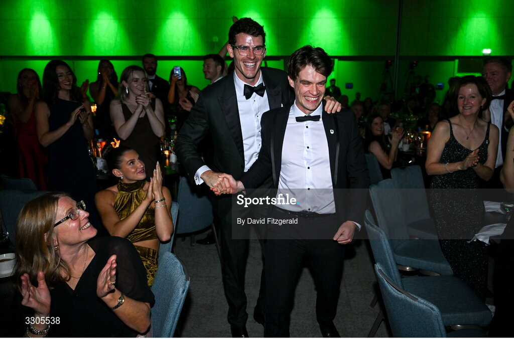 6 December 2025; World Bronze Medallists in Rowing, Fintan McCarthy , right, and Philip Doyle, make their way to the stage to collect their Team of the Year Award, sponsored by Flogas, during the Team Ireland Olympic Sport Awards 2025 at The Royal Convention Centre in Dublin. Photo by David Fitzgerald/Sportsfile