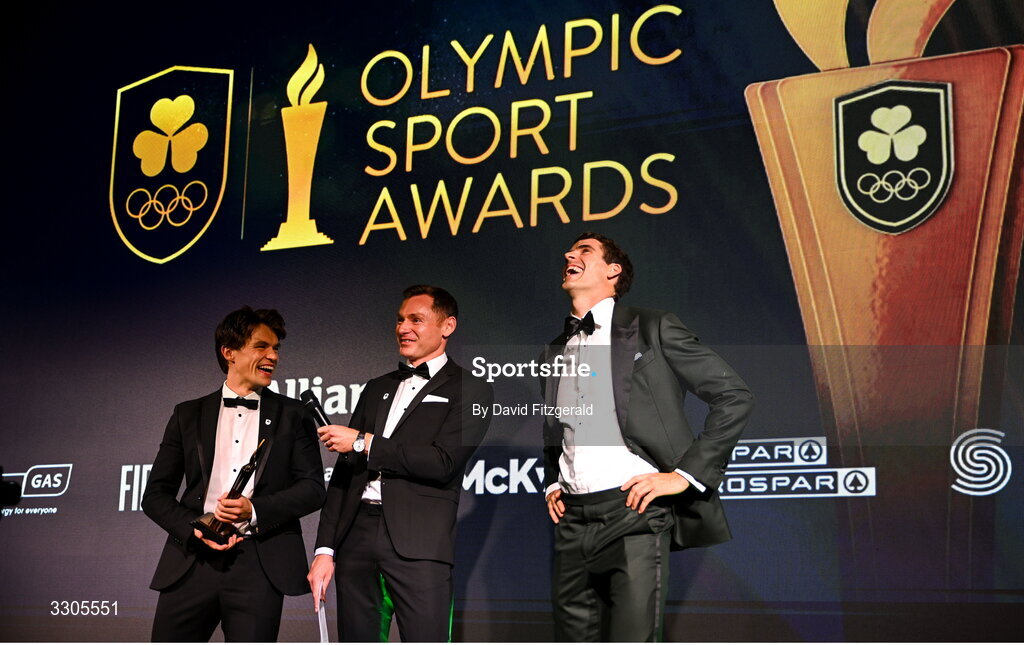 6 December 2025; World Bronze Medallists in Rowing, Fintan McCarthy, left, and Philip Doyle, right, are interviewed by MC David Gillick as they collect their Team of the Year Award, sponsored by Flogas, during the Team Ireland Olympic Sport Awards 2025 at The Royal Convention Centre in Dublin. Photo by David Fitzgerald/Sportsfile