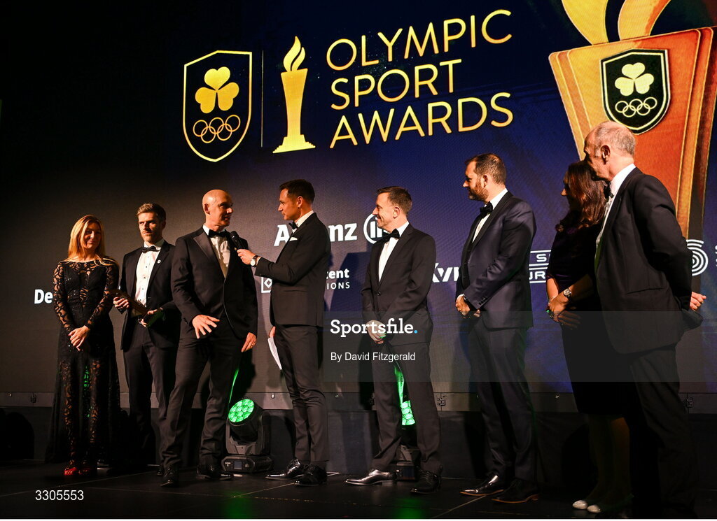 6 December 2025; Head Coach of Cycling Ireland Neill Delahaye, third from left, is interviewed my MC David Gillick, after collecting the High Performance Programme of the Year Award, sponsored by Deloitte, during the Team Ireland Olympic Sport Awards 2025 at The Royal Convention Centre in Dublin. Photo by David Fitzgerald/Sportsfile