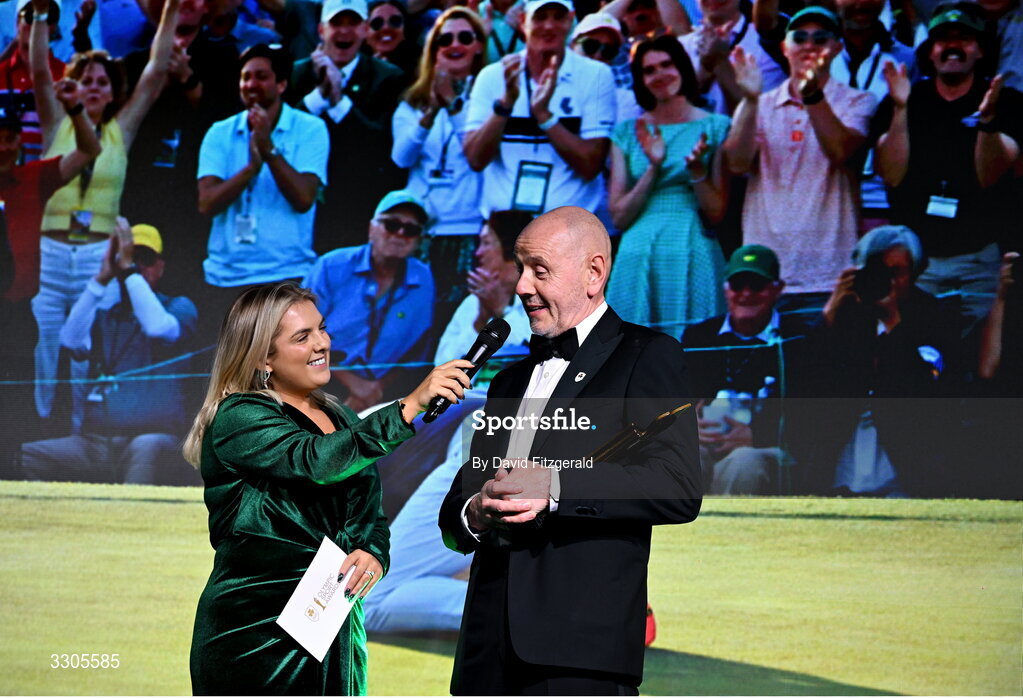 6 December 2025; Brian McIlroy, representing his nephew Rory McIlroy, is interviewed by MC Valerie Wheeler, after collecting the Male Athlete of the Year Award, sponsored by Allianz, during the Team Ireland Olympic Sport Awards 2025 at The Royal Convention Centre in Dublin. Photo by David Fitzgerald/Sportsfile