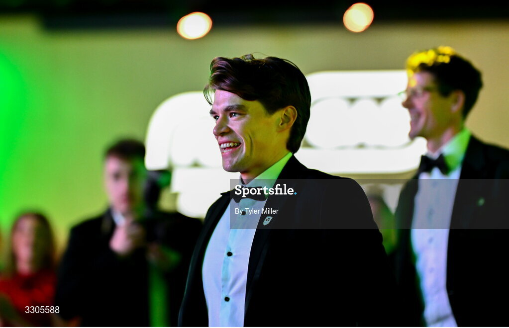 6 December 2025; World Bronze Medallists in Rowing, Fintan McCarthy, makes his way onto the stage to collect the Team of the Year Award, sponsored by Flogas, by John Rooney, Managing Director at Flogas,during the Team Ireland Olympic Sport Awards 2025 at The Royal Convention Centre in Dublin. Photo by Tyler Miller/Sportsfile