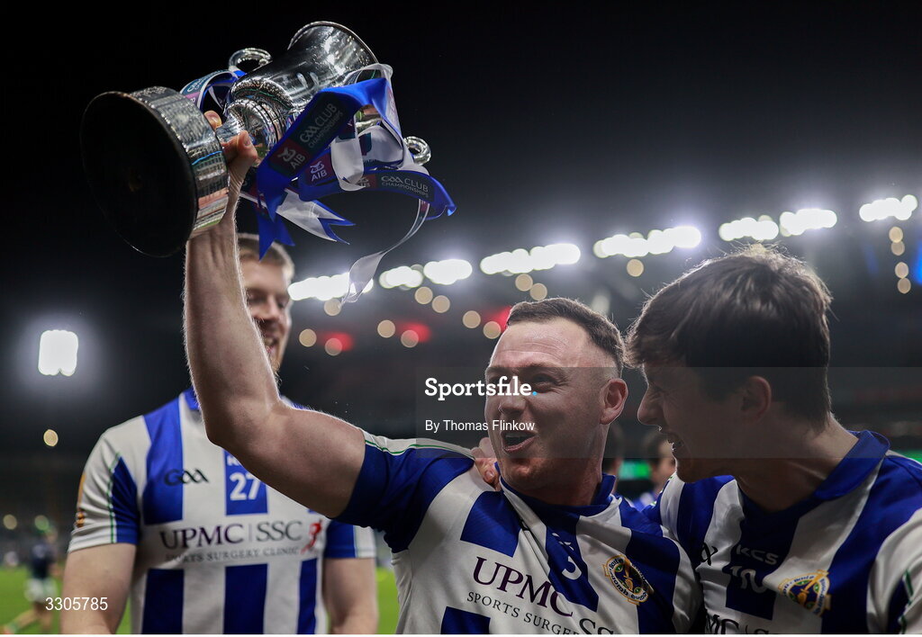 6 December 2025; Ballyboden St Enda's players Cathal Flaherty, left, and James Madden celebrate with the Seán McCabe Cup after their side's victory the AIB Leinster GAA Football Senior Club Championship final match between Athy of Kildare and Ballyboden St Enda's of Dublin at Croke Park in Dublin. Photo by Thomas Flinkow/Sportsfile