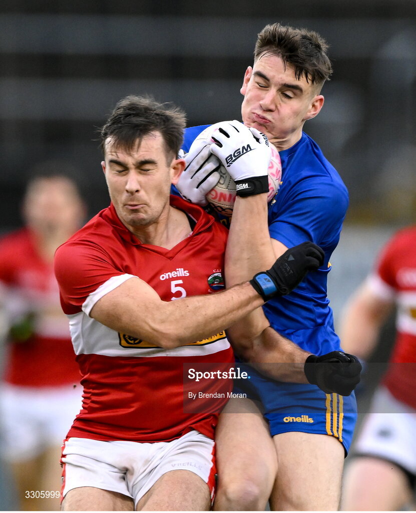 7 December 2025; Rickey Barrett of St Finbarr's is tackled by Aidan O'Connor of Dingle during the AIB Munster GAA Football Senior Club Championship final match between Dingle and St Finbarr's at FBD Semple Stadium in Thurles, Tipperary. Photo by Brendan Moran/Sportsfile