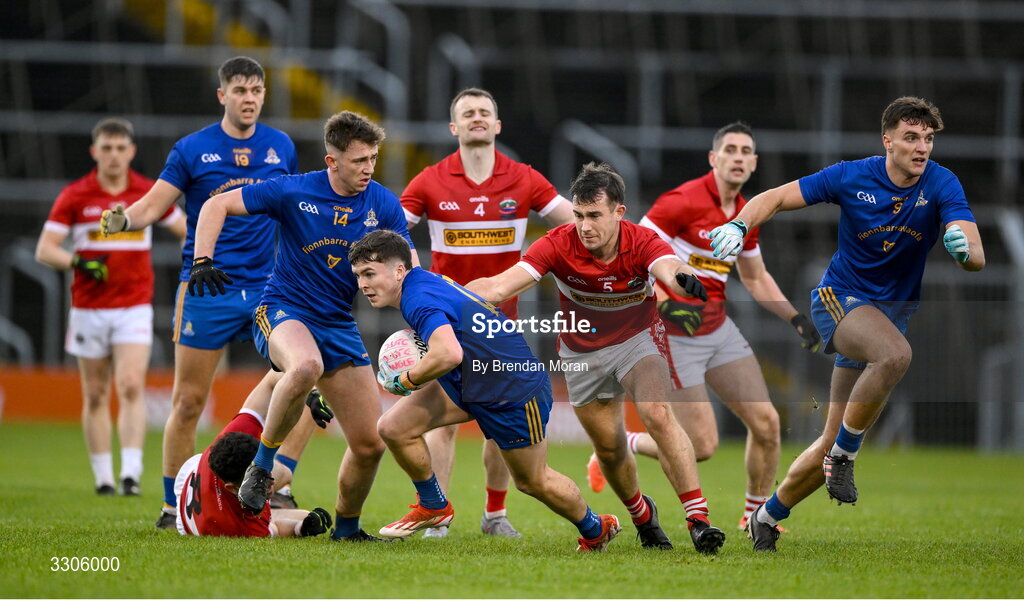 7 December 2025; John Wigginton Barrett of St Finbarr's gathers possession ahead of Aidan O'Connor of Dingle during the AIB Munster GAA Football Senior Club Championship final match between Dingle and St Finbarr's at FBD Semple Stadium in Thurles, Tipperary. Photo by Brendan Moran/Sportsfile