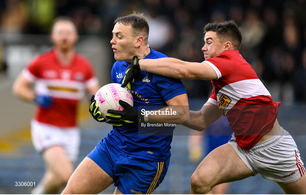 7 December 2025; Steven Sherlock of St Finbarr's is tackled by Conor Flannery of Dingle during the AIB Munster GAA Football Senior Club Championship final match between Dingle and St Finbarr's at FBD Semple Stadium in Thurles, Tipperary. Photo by Brendan Moran/Sportsfile