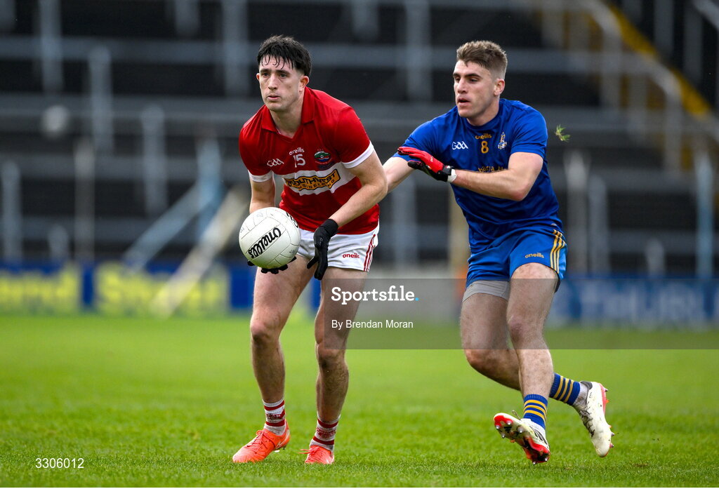 7 December 2025; Niall Geaney of Dingle is tackled by Ian Maguire of St Finbarr's during the AIB Munster GAA Football Senior Club Championship final match between Dingle and St Finbarr's at FBD Semple Stadium in Thurles, Tipperary. Photo by Brendan Moran/Sportsfile