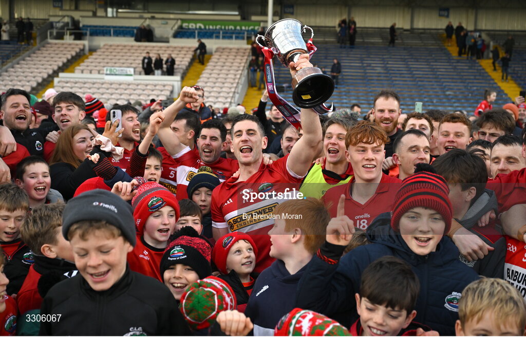 7 December 2025; Dingle captain Paul Geaney and teammates celebrate with the cup after the AIB Munster GAA Football Senior Club Championship final match between Dingle and St Finbarr's at FBD Semple Stadium in Thurles, Tipperary. Photo by Brendan Moran/Sportsfile