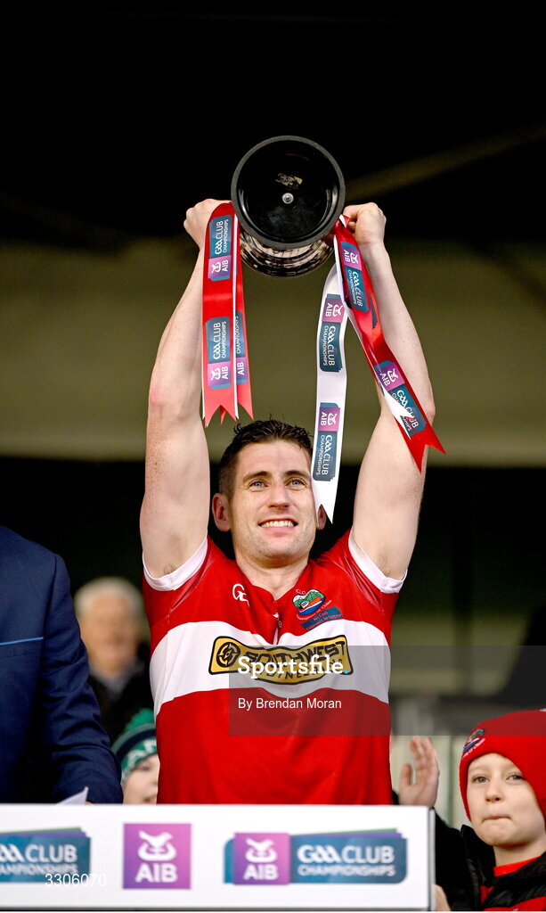 7 December 2025; Dingle captain Paul Geaney, with his son Páidí, lifts the cup after the AIB Munster GAA Football Senior Club Championship final match between Dingle and St Finbarr's at FBD Semple Stadium in Thurles, Tipperary. Photo by Brendan Moran/Sportsfile