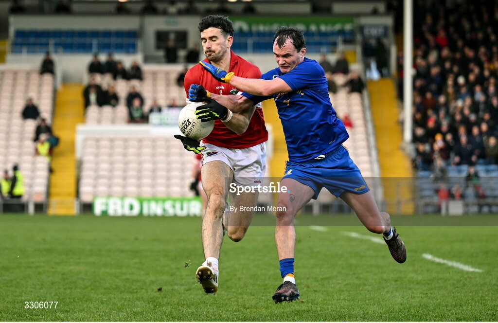 7 December 2025; Mark O'Connor of Dingle is tackled by Conor Dennehy of St Finbarr's during the AIB Munster GAA Football Senior Club Championship final match between Dingle and St Finbarr's at FBD Semple Stadium in Thurles, Tipperary. Photo by Brendan Moran/Sportsfile