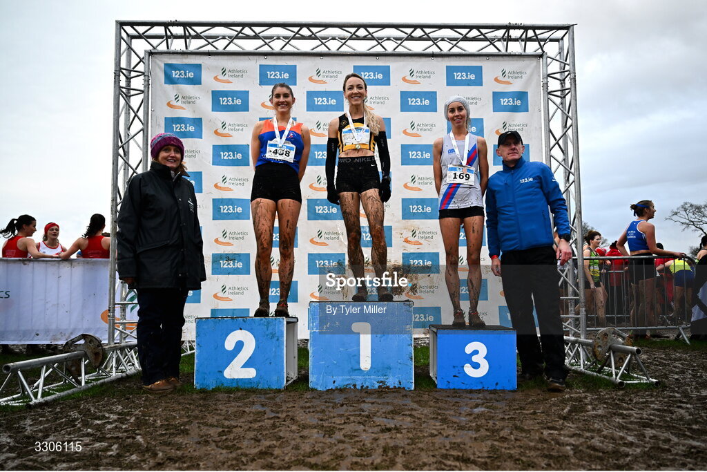 7 December 2025; Novice Women 4000m medalists, from second from left, Stephanie Cotter of West Muskerry AC, Cork, silver, Dearbhla Cox of Annadale Striders, Antrim, gold, centre, and Alex Murphy of Dundrum South Dublin AC, Dublin, second from right, with Athletics Ireland President Brid Golden, left, and Chief Executive Officer at Intact Insurance Ireland Kevin Thompson, after the Novice Women 4000m during the 123.ie National Novice and Juvenile Uneven Age Cross Country Championships at the Sport Ireland National Cross Country Track in Abbotstown, Dublin. Photo by Tyler Miller/Sportsfile