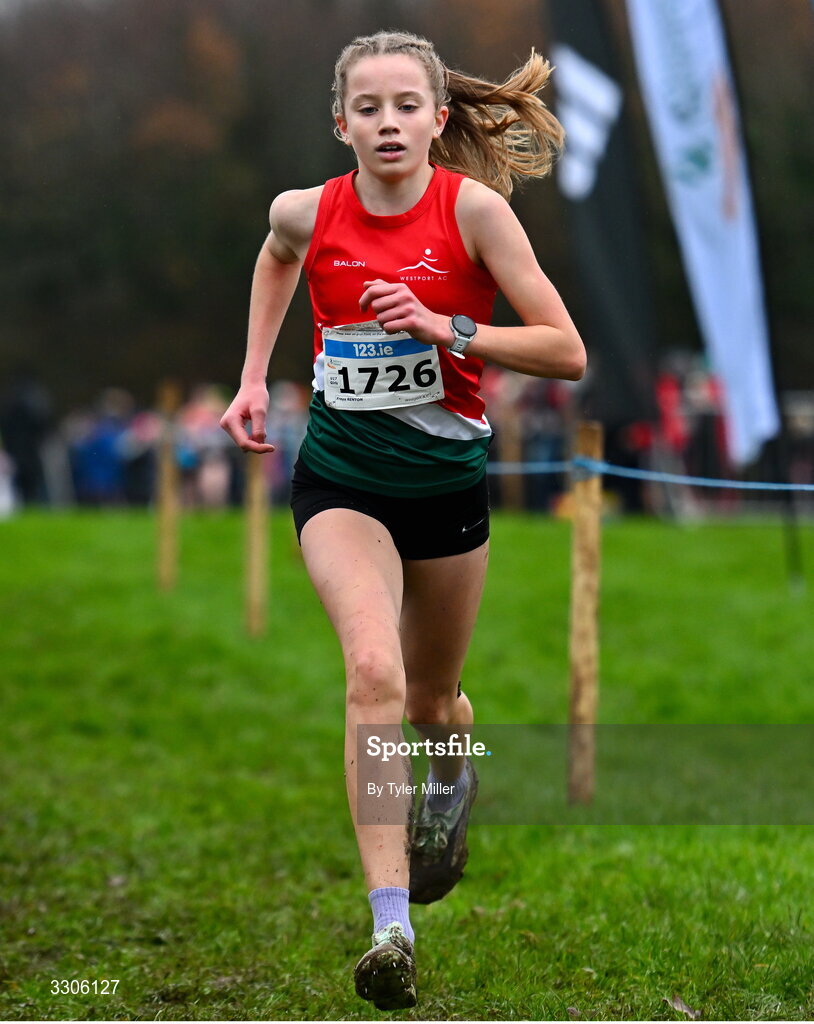 7 December 2025; Freya Renton of Westport AC, Mayo, crosses the finish line to win the U17 Girls 4500m during the 123.ie National Novice and Juvenile Uneven Age Cross Country Championships at the Sport Ireland National Cross Country Track in Abbotstown, Dublin. Photo by Tyler Miller/Sportsfile
