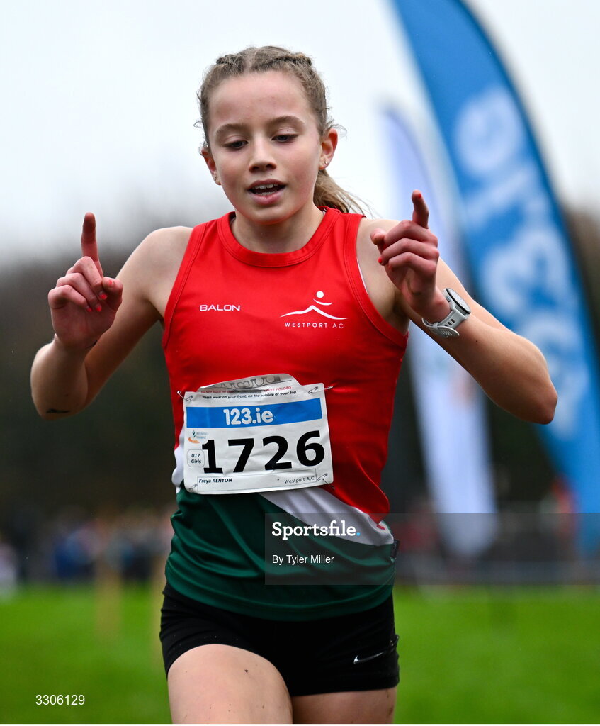 7 December 2025; Freya Renton of Westport AC, Mayo, crosses the finish line to win the U17 Girls 4500m during the 123.ie National Novice and Juvenile Uneven Age Cross Country Championships at the Sport Ireland National Cross Country Track in Abbotstown, Dublin. Photo by Tyler Miller/Sportsfile