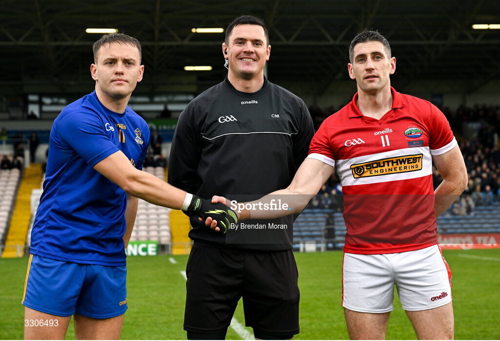 7 December 2025; Referee Chris Maguire with team captains Steven Sherlock of St Finbarr's, left, and Paul Geaney of Dingle before the AIB Munster GAA Football Senior Club Championship final match between Dingle and St Finbarr's at FBD Semple Stadium in Thurles, Tipperary. Photo by Brendan Moran/Sportsfile