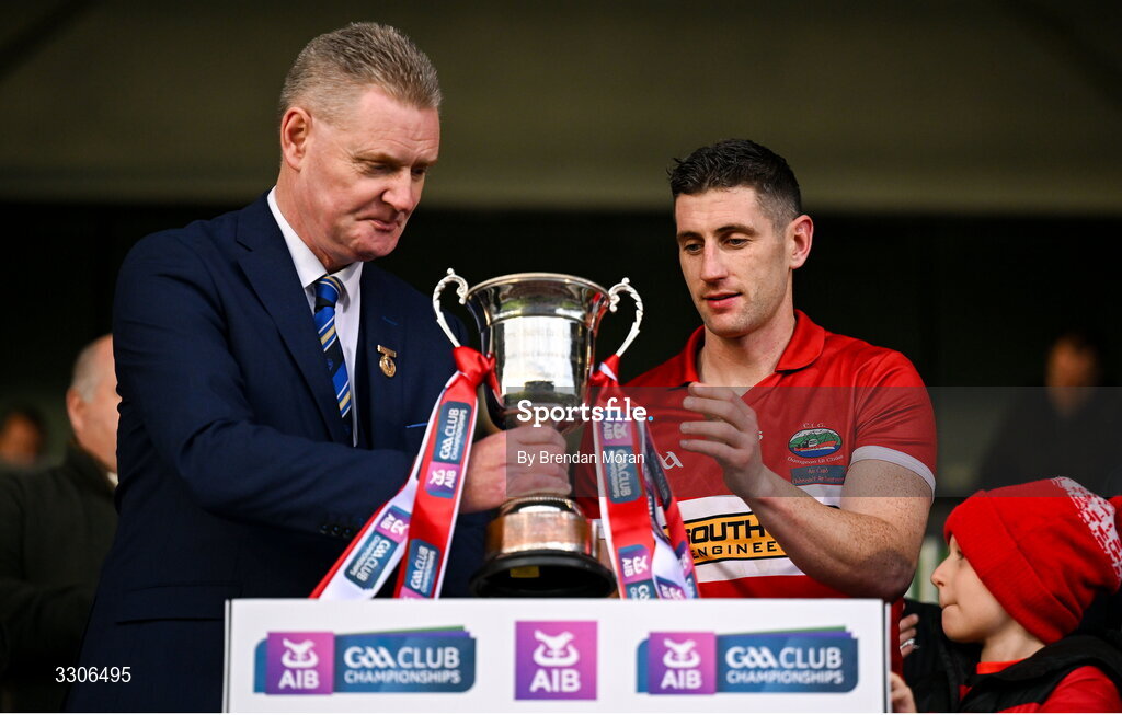 7 December 2025; Dingle captain Paul Geaney lifts the cup after is presented with the cup by Munster Council chairman Tim Murphy after the AIB Munster GAA Football Senior Club Championship final match between Dingle and St Finbarr's at FBD Semple Stadium in Thurles, Tipperary. Photo by Brendan Moran/Sportsfile