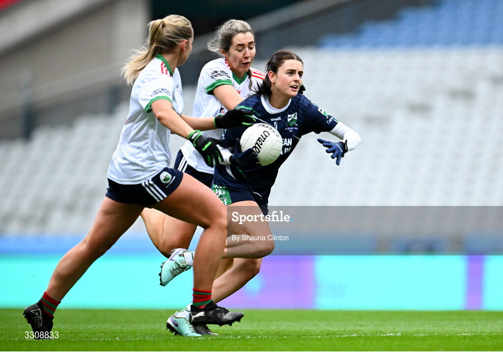 13 December 2025; Saoirse Murray of Caltra Cuans in action against Sinéad O'Reilly of Knockbride during the AIB All-Ireland Ladies Football Club Intermediate Club Championship final match between Knockbride of Cavan and Caltra Cuans of Galway at Croke Park in Dublin. Photo by Shauna Clinton/Sportsfile